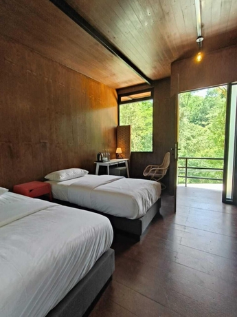 Imagen de la habitación del Hotel The HIJAU Camp and Cabin. Foto 2