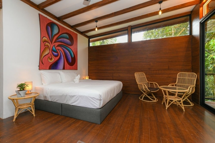 Imagen de la habitación del Hotel The HIJAU Camp and Cabin. Foto 12