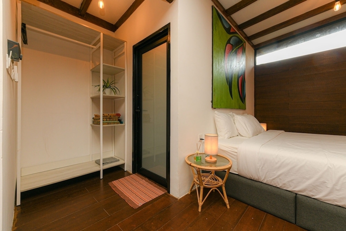 Imagen de la habitación del Hotel The HIJAU Camp and Cabin. Foto 13