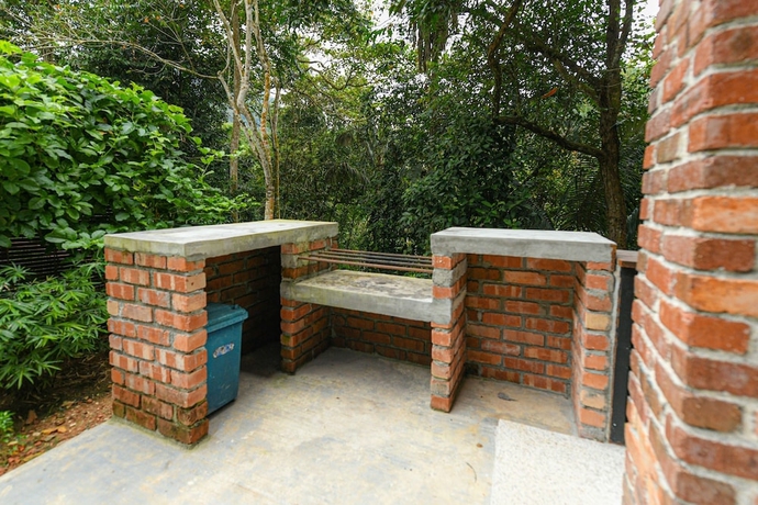 Imagen de la habitación del Hotel The HIJAU Camp and Cabin. Foto 15