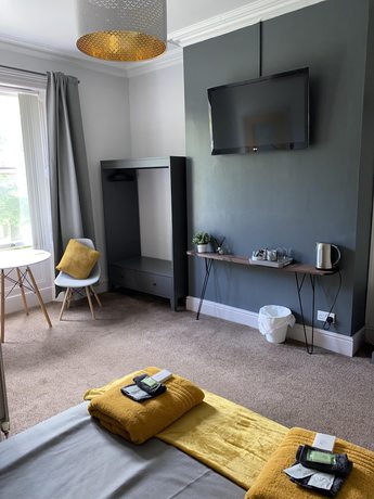 Imagen de la habitación del Hotel The Hall Park. Foto 11