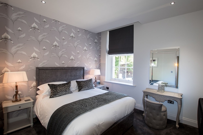 Imagen de la habitación del Hotel The Halston. Foto 6