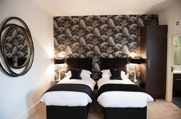 Imagen de la habitación del Hotel The Halston. Foto 7