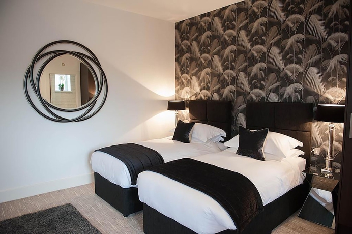 Imagen de la habitación del Hotel The Halston. Foto 8