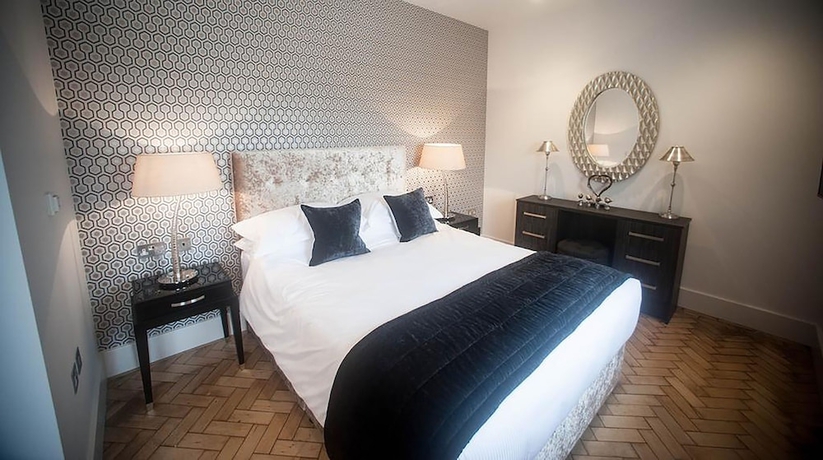 Imagen de la habitación del Hotel The Halston. Foto 17