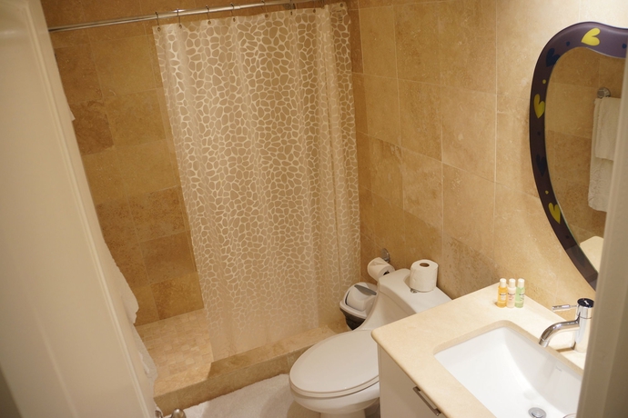 Imagen de la habitación del Hotel The Hamilton Beach Villas and Spa. Foto 6