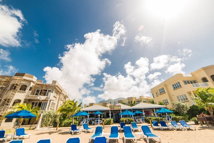 Imagen de los exteriores del Hotel The Hamilton Beach Villas and Spa. Foto 11