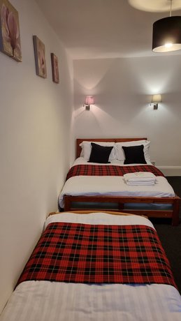 Imagen de la habitación del Hotel The Hampton Court Guesthouse. Foto 5