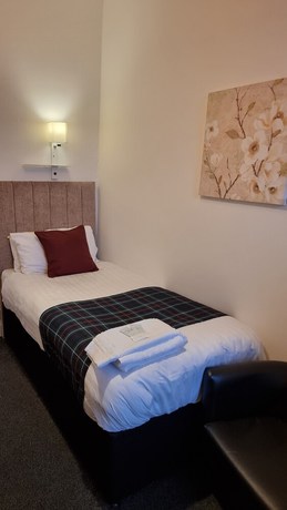 Imagen de la habitación del Hotel The Hampton Court Guesthouse. Foto 9