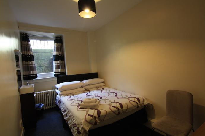 Imagen de la habitación del Hotel The Hampton Court Guesthouse. Foto 17