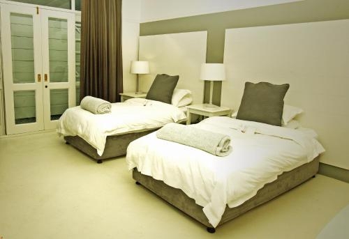 Imagen de la habitación del Hotel The Hampton Exclusive Guest House. Foto 6
