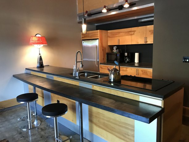 Imagen de la habitación del Hotel The Hangar Lofts. Foto 5