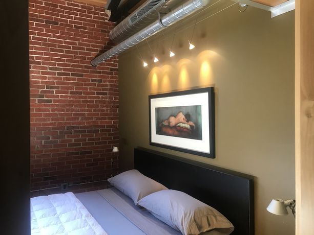 Imagen de la habitación del Hotel The Hangar Lofts. Foto 14