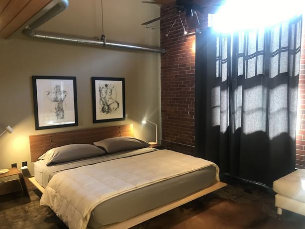 Imagen de la habitación del Hotel The Hangar Lofts. Foto 16