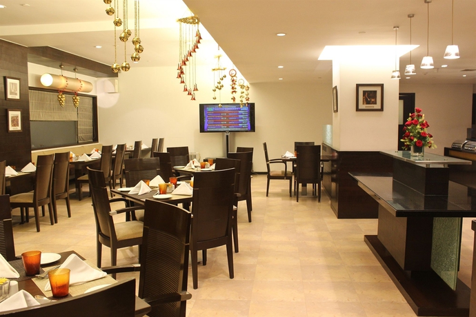 Imagen del bar/restaurante del Hotel The Hans New Delhi. Foto 4