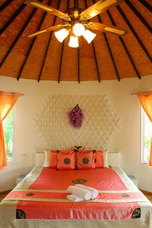 Imagen de la habitación del Hotel The Happiness Resort. Foto 19