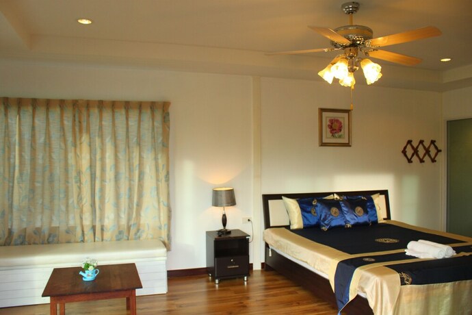 Imagen de la habitación del Hotel The Happiness Resort. Foto 23