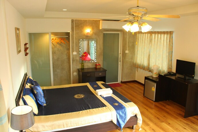 Imagen de la habitación del Hotel The Happiness Resort. Foto 24