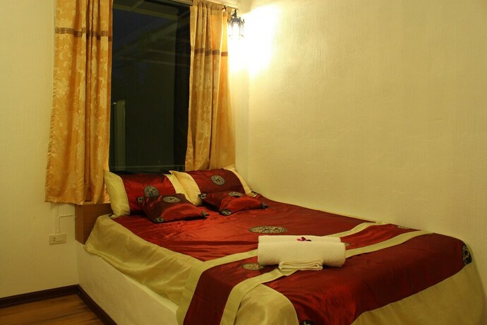 Imagen de la habitación del Hotel The Happiness Resort. Foto 25