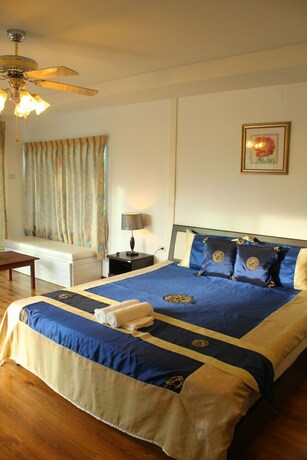 Imagen de la habitación del Hotel The Happiness Resort. Foto 28