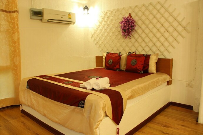 Imagen de la habitación del Hotel The Happiness Resort. Foto 30