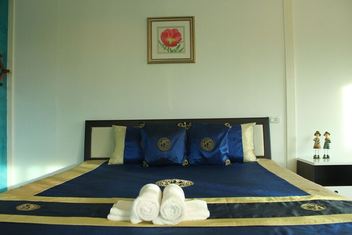 Imagen de la habitación del Hotel The Happiness Resort. Foto 32