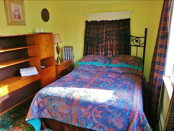 Imagen de la habitación del Hotel The Harbor House Bed And Breakfast. Foto 10