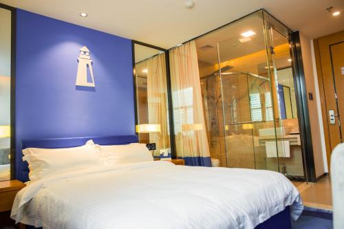 Imagen de la habitación del Hotel The Harbour, Guangzhou. Foto 8