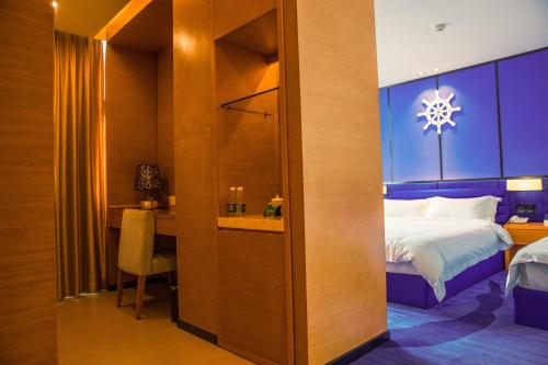 Imagen de la habitación del Hotel The Harbour, Guangzhou. Foto 9