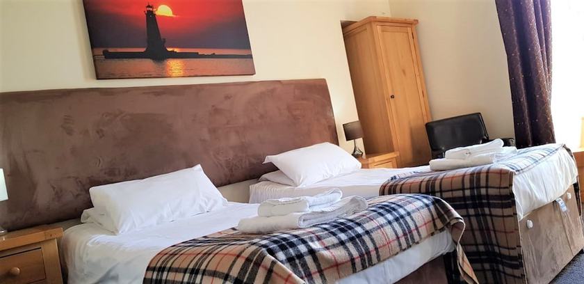 Imagen de la habitación del Hotel The Harbour House. Foto 9