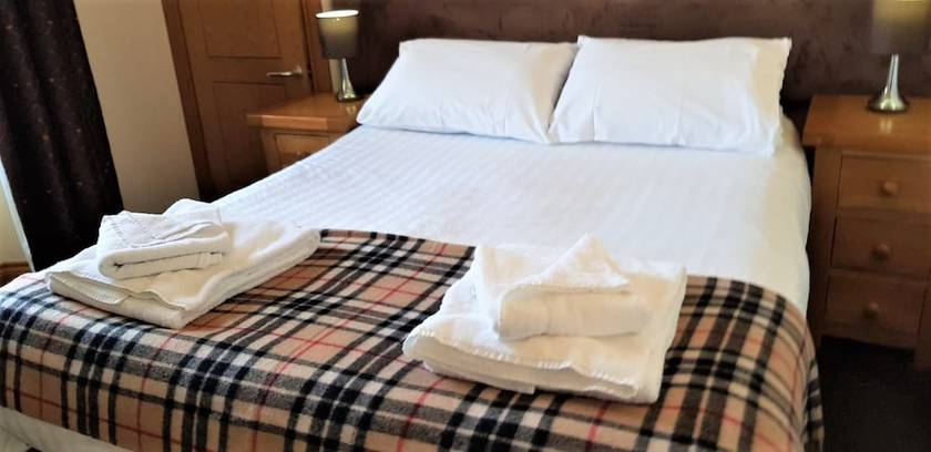 Imagen de la habitación del Hotel The Harbour House. Foto 10