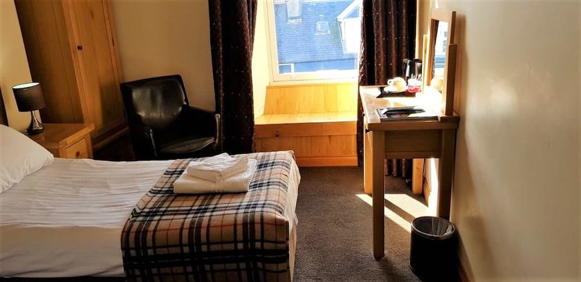 Imagen de la habitación del Hotel The Harbour House. Foto 11