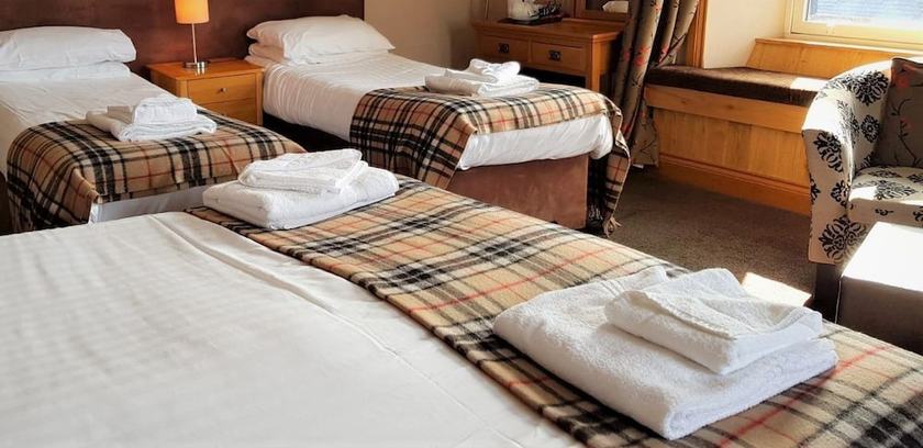 Imagen de la habitación del Hotel The Harbour House. Foto 13