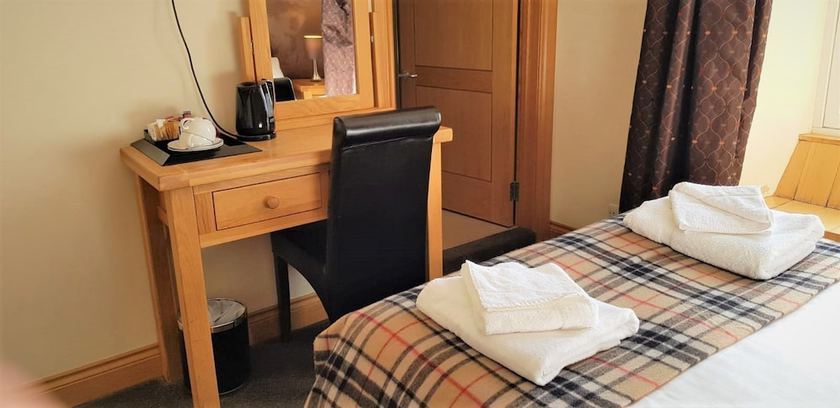 Imagen de la habitación del Hotel The Harbour House. Foto 16