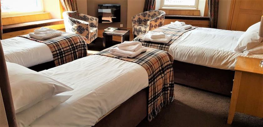 Imagen de la habitación del Hotel The Harbour House. Foto 17