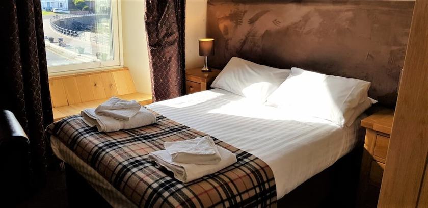 Imagen de la habitación del Hotel The Harbour House. Foto 18