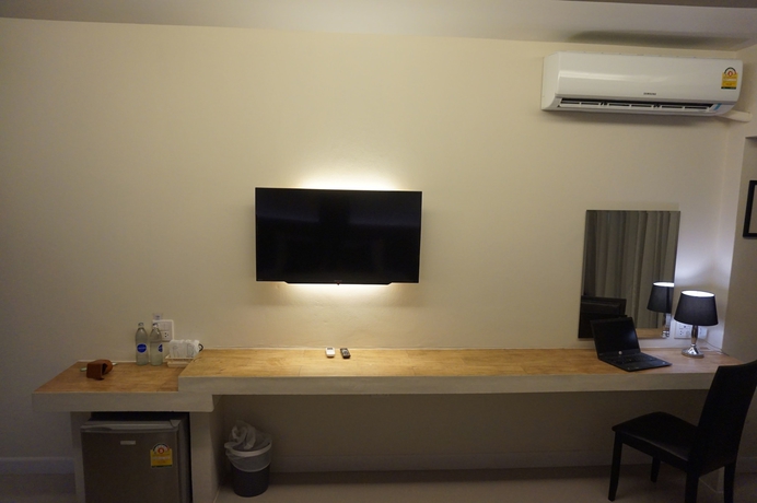 Imagen de la habitación del Hotel The Harmony Ville. Foto 8