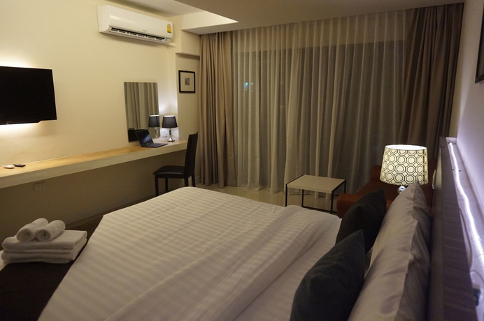 Imagen de la habitación del Hotel The Harmony Ville. Foto 9