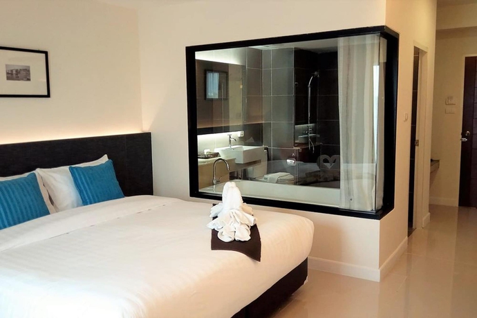 Imagen de la habitación del Hotel The Harmony Ville. Foto 10
