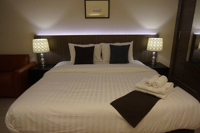 Imagen de la habitación del Hotel The Harmony Ville. Foto 11