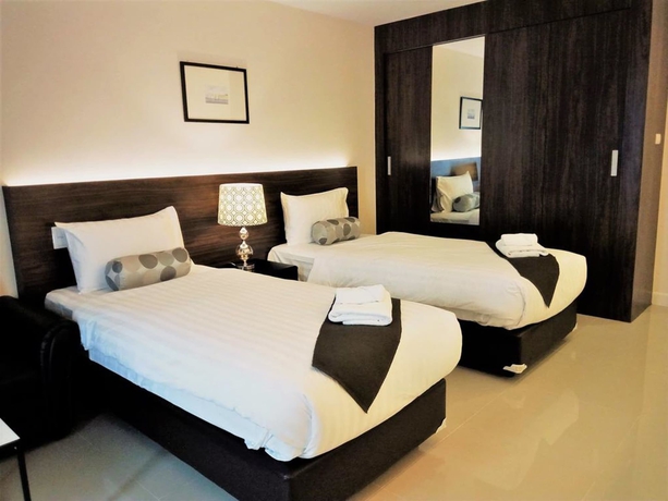 Imagen de la habitación del Hotel The Harmony Ville. Foto 12