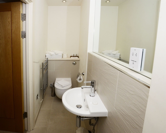 Imagen de la habitación del Hotel The Harrington Collection. Foto 2