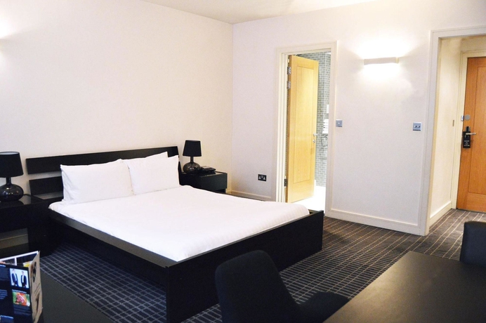 Imagen de la habitación del Hotel The Harrington Collection. Foto 12