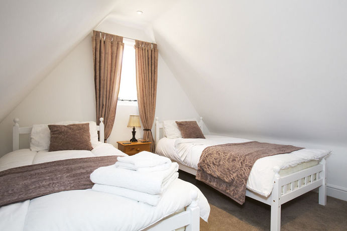 Imagen de la habitación del Hotel The Harvard Inn. Foto 13