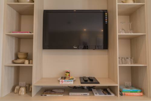 Imagen de la habitación del Hotel The Haus Studio Apartments. Foto 4