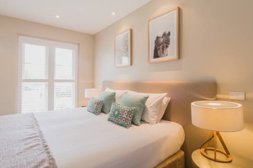 Imagen de la habitación del Hotel The Haus Studio Apartments. Foto 6