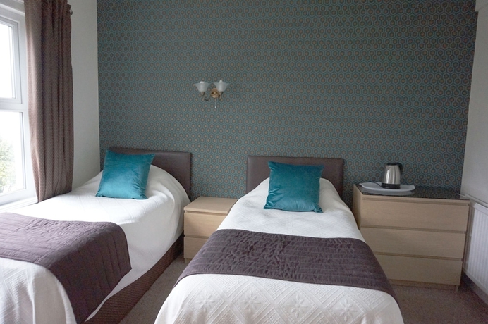 Imagen de la habitación del Hotel The Havelock. Foto 5