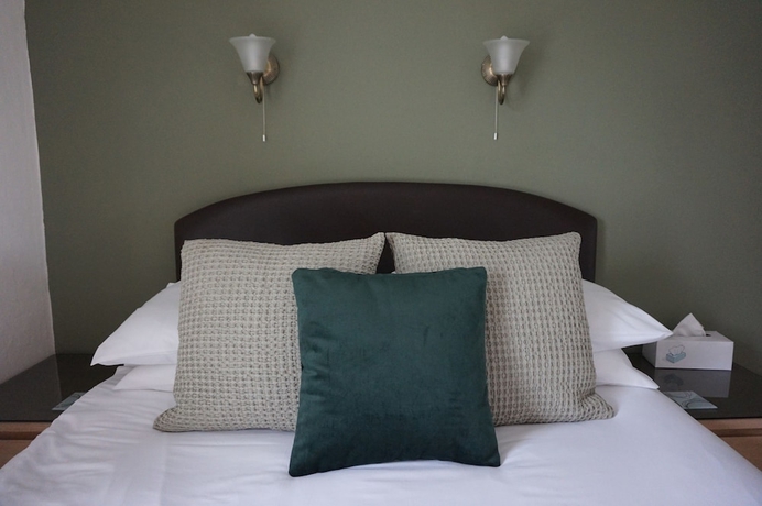 Imagen de la habitación del Hotel The Havelock. Foto 11
