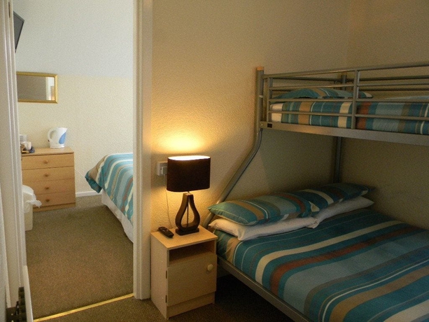 Imagen de la habitación del Hotel The Hawkes. Foto 1