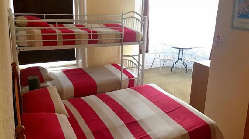 Imagen de la habitación del Hotel The Hawkes. Foto 6